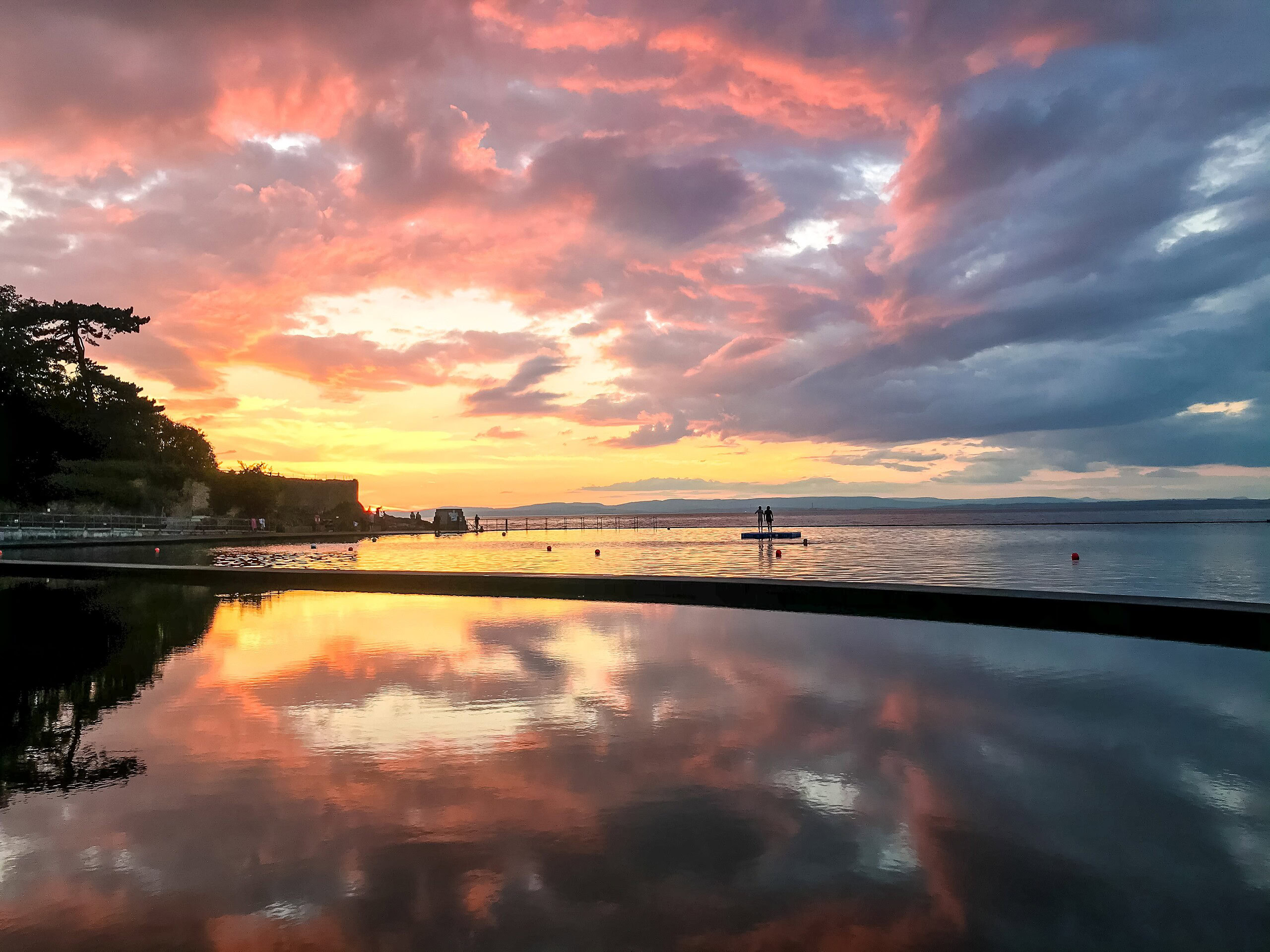 sunset swims in winter